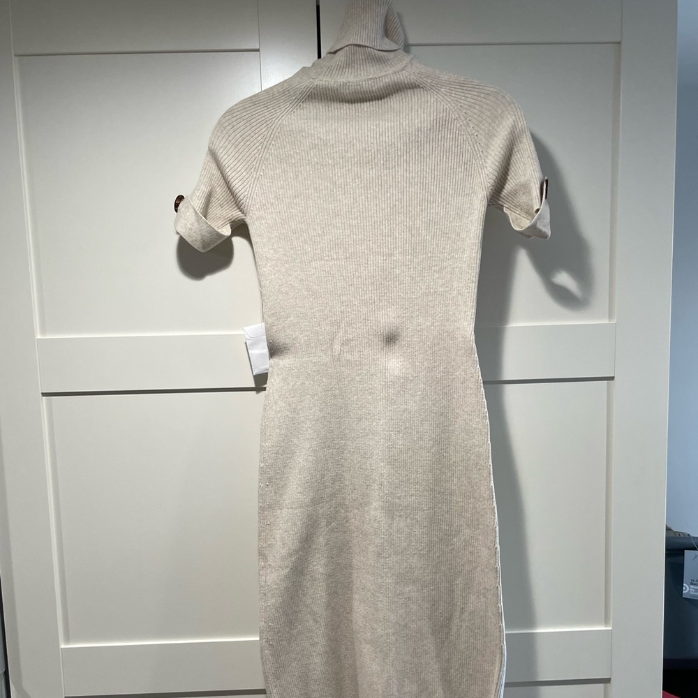 Moda international short sleeve sweater dress in size small